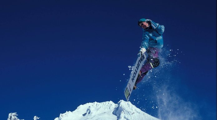 Kim Kardashian Shows Off Deep Cleavage In Plunging Top & Mini