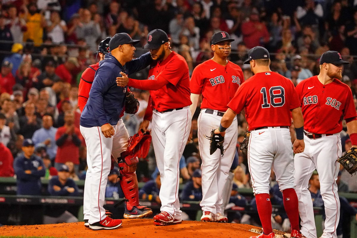 Alex Cora and Eduardo Rodriguez of the Boston Red Sox