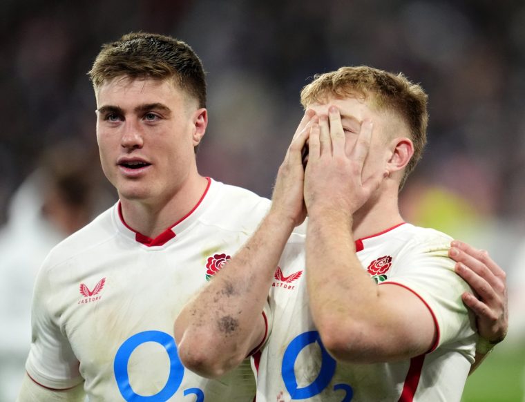 England's Tommy Freeman and Fin Smith appear dejected following during the Guinness Men's Six Nations match at the Stade de France in Paris, France. Picture date: Saturday March 14, 2026. PA Photo. Photo credit should read: Adam Davy/PA Wire. RESTRICTIONS: Use subject to restrictions. Editorial use only, no commercial use without prior consent from rights holder.