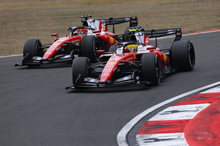 SHANGHAI, CHINA - MARCH 15: Lewis Hamilton of Great Britain driving the (44) Scuderia Ferrari SF-26 and Charles Leclerc of Monaco driving the (16) Scuderia Ferrari SF-26 battle for track position during the F1 Grand Prix of China at Shanghai International Circuit on March 15, 2026 in Shanghai, China. (Photo by Alastair Staley/LAT Images)