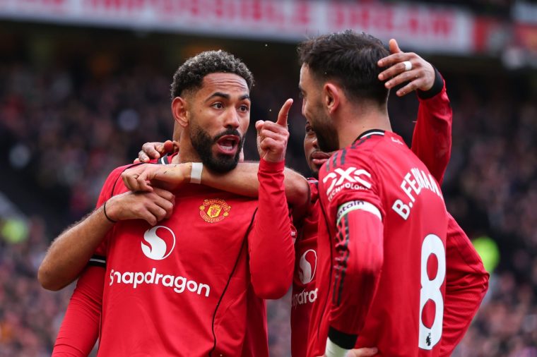 MANCHESTER, ENGLAND - MARCH 15: Matheus Cunha of Manchester United celebrates scoring their second goal with Bruno Fernandes during the Premier League match between Manchester United and Aston Villa at Old Trafford on March 15, 2026 in Manchester, England. (Photo by Marc Atkins/Getty Images)