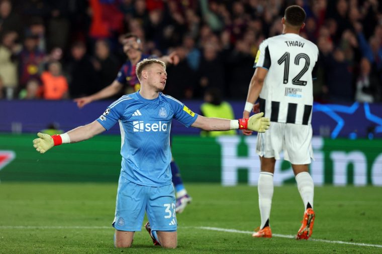 Newcastle United's English goalkeeper #32 Aaron Ramsdale reacts to Barcelona's Polish forward #09 Robert Lewandowski's second goal during the UEFA Champions League last 16 second leg football match between FC Barcelona and Newcastle United at the Camp Nou stadium in Barcelona, on March 18, 2026. (Photo by Lluis GENE / AFP via Getty Images)