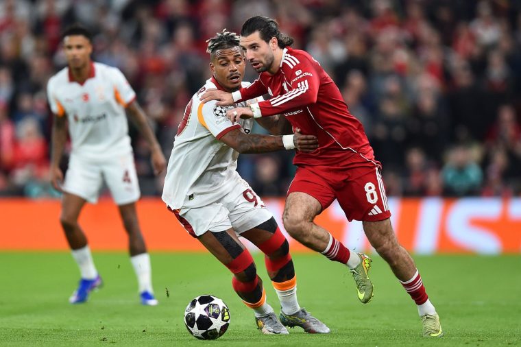 LIVERPOOL, ENGLAND - MARCH 18: Dominik Szoboszlai of Liverpool in action with Mario Lemina of Galatasaray during the UEFA Champions League 2025/26 Round of 16 Second Leg match between Liverpool FC and Galatasaray SK at Anfield on March 18, 2026 in Liverpool, England. (Photo by Chris Brunskill/Fantasista/Getty Images)