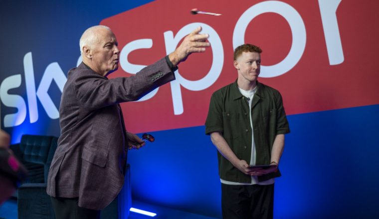 LONDON, ENGLAND - DECEMBER 15: Barry Hearn interviewed backstage by Joe Thomlinson during The Darts championship at Alexandra Palace on December 15, 2024 in London, England. (Photo by Stuart C. Wilson/Getty Images for Sky Creative Brand )