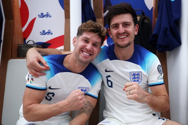 LONDON, ENGLAND - OCTOBER 17: John Stones and Harry Maguire of England pose for a photo in the dressing room after the team's victory during the UEFA EURO 2024 European qualifier match between England and Italy at Wembley Stadium on October 17, 2023 in London, England. (Photo by Eddie Keogh - The FA/The FA via Getty Images)