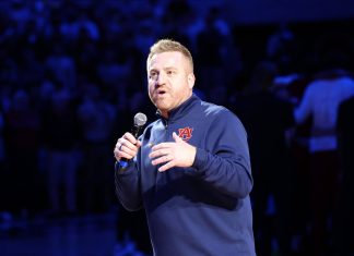 Alex Golesh Defends Inviting 220+ Former Players as Cam Newton Sends Blunt Message