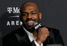 Jon Jones Slaps His Own Face Tattoo on Fan, Leaving MMA World Confused
