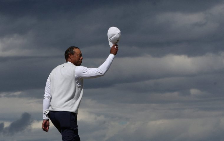 FILE PHOTO: Golf - The 150th Open Championship - Old Course, St Andrews, Scotland, Britain - July 15, 2022 Tiger Woods of the U.S. reacts on the 18th during the second round REUTERS/Paul Childs/File Photo