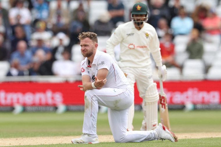 England's Sam Cook appeals for an LBW (leg before wicket) decision against Zimbabwe's Sikandar Raza on the third day of the four day Test cricket match between England and Zimbabwe at Trent Bridge in Nottingham on May 24, 2025. (Photo by Darren Staples / AFP) / RESTRICTED TO EDITORIAL USE. NO ASSOCIATION WITH DIRECT COMPETITOR OF SPONSOR, PARTNER, OR SUPPLIER OF THE ECB (Photo by DARREN STAPLES/AFP via Getty Images)