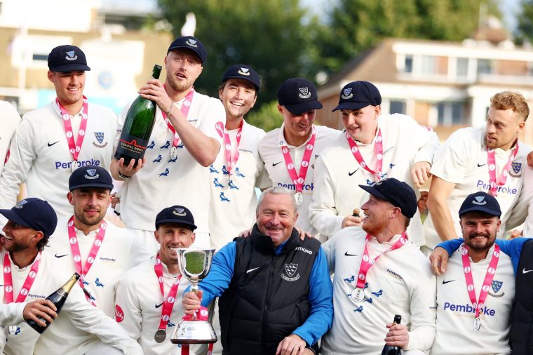 HOVE, ENGLAND - SEPTEMBER 29: Sussex Cricket Head Coach Paul Farbrace celebrates with his team after Sussex are crowned Division Two Champions at the Vitality County Championship match between Sussex and Middlesex at The 1st Central County Ground on September 29, 2024 in Hove, England. (Photo by Bryn Lennon/Getty Images)