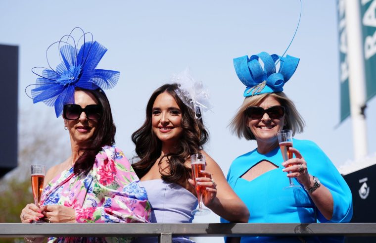 Racegoers on Ladies Day of the Randox Grand National Festival 2026 at Aintree Racecourse. Picture date: Friday April 10, 2026. PA Photo. Photo credit should read: Owen Humphreys/PA Wire. RESTRICTIONS: Use subject to restrictions. Editorial use only, no commercial use without prior consent from rights holder.