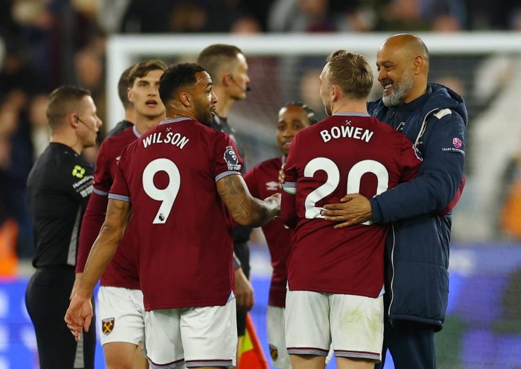 Soccer Football - Premier League - West Ham United v Wolverhampton Wanderers - London Stadium, London, Britain - April 10, 2026 West Ham United's Callum Wilson, Jarrod Bowen and manager Nuno Espirito Santo celebrate after the match Action Images via Reuters/Matthew Childs EDITORIAL USE ONLY. NO USE WITH UNAUTHORIZED AUDIO, VIDEO, DATA, FIXTURE LISTS, CLUB/LEAGUE LOGOS OR 'LIVE' SERVICES. ONLINE IN-MATCH USE LIMITED TO 120 IMAGES, NO VIDEO EMULATION. NO USE IN BETTING, GAMES OR SINGLE CLUB/LEAGUE/PLAYER PUBLICATIONS. PLEASE CONTACT YOUR ACCOUNT REPRESENTATIVE FOR FURTHER DETAILS..