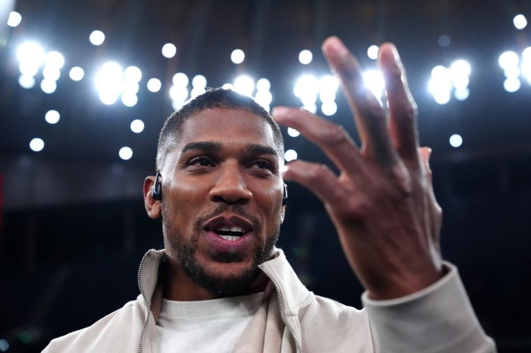 Anthony Joshua reacts following the heavy weight bout between Tyson Fury and Arslanbek Makhmudov at Tottenham Hotspur Stadium, London. Picture date: Saturday April 11, 2026. PA Photo. Photo credit should read: Bradley Collyer/PA Wire. RESTRICTIONS: Use subject to restrictions. Editorial use only, no commercial use without prior consent from rights holder.