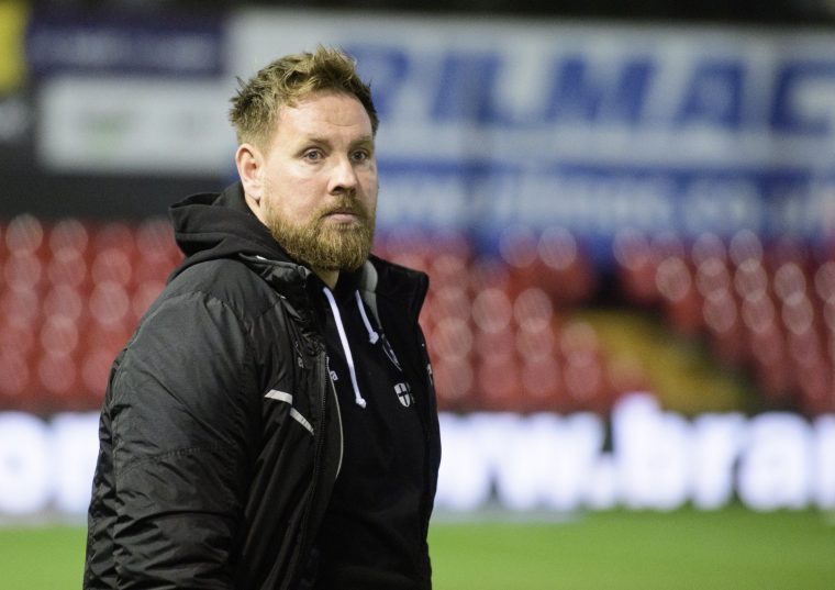 LINCOLN, ENGLAND - MARCH 4: Rob Elliot, manager of Crawley Town during the Sky Bet League One match between Lincoln City FC and Crawley Town FC at LNER Stadium on March 4, 2025 in Lincoln, England. (Photo by Andrew Vaughan/Getty Images)