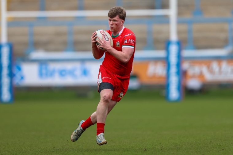 North Wales Crusaders make a break during the BETFRED Championship match against Halifax Panthers at The Shay in Halifax, United Kingdom, on March 22, 2026. (Photo by Simon Hall/MI News/NurPhoto via Getty Images)