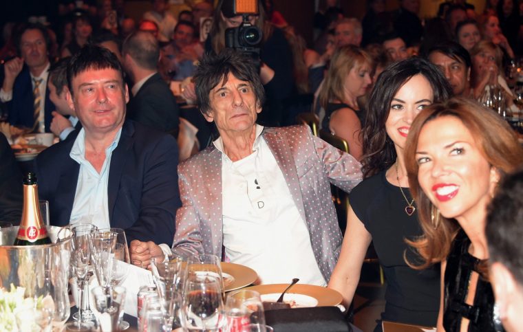 LONDON, ENGLAND - MARCH 19: Jimmy White, Ronnie Wood with his wife Sally Wood and Heather Kerzner during The Roundhouse Gala held at the Roundhouse on March 19, 2015 in London, England. (Photo by David M. Benett/Getty Images for The Roundhouse Trust)