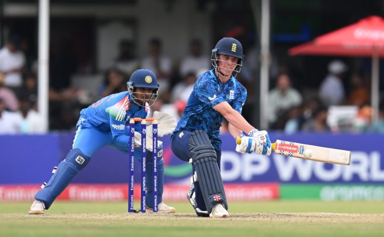HARARE, ZIMBABWE - FEBRUARY 06: Ben Mayes of England plays a shot as Abhigyan Kundu of India keeps during the ICC U19 Men's Cricket World Cup 2026 Final between England and India at Harare Sports Club on February 06, 2026 in Harare, Zimbabwe. (Photo by Johan Rynners-ICC/ICC via Getty Images)