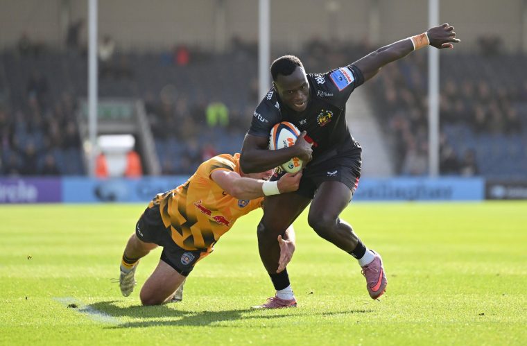 EXETER, ENGLAND - OCTOBER 04: Paul Brown-Bampoe of Exeter Chiefs is tackled by Oll Spencer of Newcastle Red Bulls during the Gallagher PREM match between Exeter Chiefs and Newcastle Red Bulls at Sandy Park on October 04, 2025 in Exeter, England. (Photo by Dan Mullan/Getty Images)