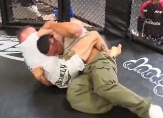 Powerlifter Larry Wheels Submitted in Seconds by Bantamweight Fighter, MMA Fans Show No Mercy