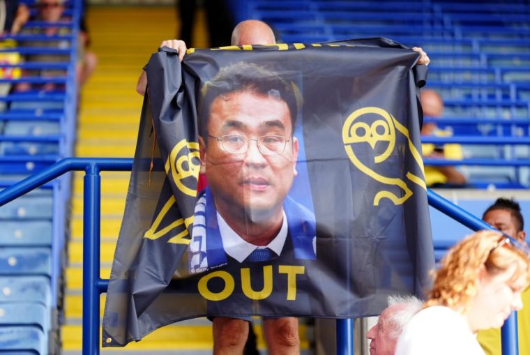Sheffield Wednesday fans in the stands protest against club owner Dejphon Chansiri ahead of the Sky Bet Championship match at the King Power Stadium, Leicester. Picture date: Sunday August 10, 2025. PA Photo. Photo credit should read: Mike Egerton/PA Wire. RESTRICTIONS: EDITORIAL USE ONLY No use with unauthorised audio, video, data, fixture lists, club/league logos or "live" services. Online in-match use limited to 120 images, no video emulation. No use in betting, games or single club/league/player publications.