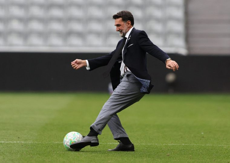 Soccer Football - Premier League - Newcastle United v Brighton & Hove Albion - St James' Park, Newcastle, Britain - May 2, 2026 Newcastle United chairman Yasir Al-Rumayyan plays football on the pitch after the match REUTERS/Scott Heppell EDITORIAL USE ONLY. NO USE WITH UNAUTHORIZED AUDIO, VIDEO, DATA, FIXTURE LISTS, CLUB/LEAGUE LOGOS OR 'LIVE' SERVICES. ONLINE IN-MATCH USE LIMITED TO 120 IMAGES, NO VIDEO EMULATION. NO USE IN BETTING, GAMES OR SINGLE CLUB/LEAGUE/PLAYER PUBLICATIONS. PLEASE CONTACT YOUR ACCOUNT REPRESENTATIVE FOR FURTHER DETAILS..