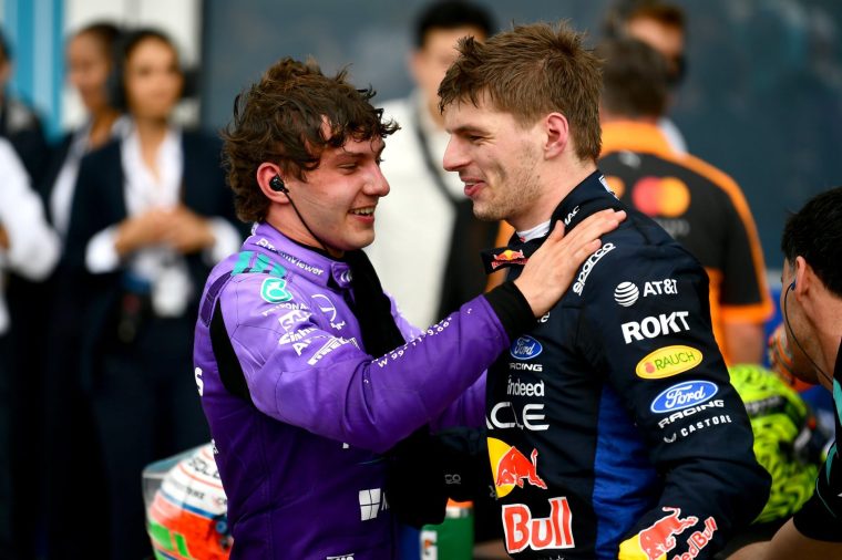 MIAMI, FLORIDA - MAY 03: Race winner Andrea Kimi Antonelli of Italy and Mercedes AMG Petronas F1 Team is congratulated by Fifth placed Max Verstappen of the Netherlands and Oracle Red Bull Racing in parc ferme during the F1 Grand Prix of Miami at Miami International Autodrome on May 03, 2026 in Miami, Florida. (Photo by James Sutton/LAT Images)