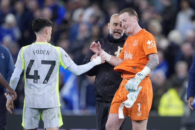 Manchester City manager Pep Guardiola (centre) speaks to Everton goalkeeper Jordan Pickford (right) after the Premier League match at Hill Dickinson Stadium, Liverpool. Picture date: Monday May 4, 2026. PA Photo. Photo credit should read: Peter Byrne/PA Wire. RESTRICTIONS: EDITORIAL USE ONLY No use with unauthorised audio, video, data, fixture lists, club/league logos or "live" services. Online in-match use limited to 120 images, no video emulation. No use in betting, games or single club/league/player publications.