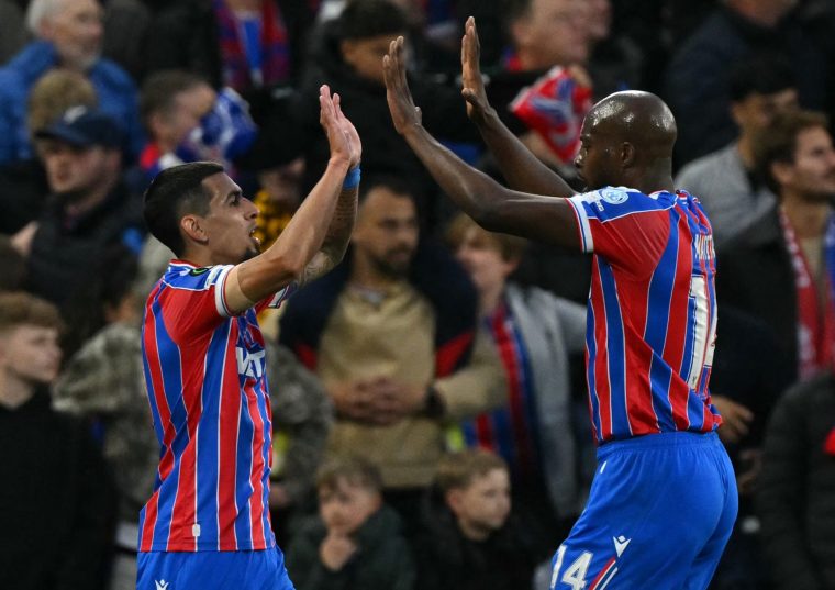 Crystal Palace's Colombian defender #02 Daniel Munoz (L) and Crystal Palace's French striker #14 Jean-Philippe Mateta celebrate the team's opening goal during the UEFA Conference semi-final second-leg football match between Crystal Palace and Shakhtar Donetsk at Selhurst Park in London on May 7, 2026. (Photo by Glyn KIRK / AFP via Getty Images)