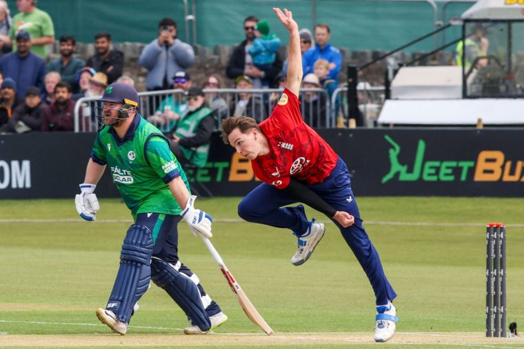England's Sonny Baker bowls during the third Twenty20 International cricket match between Ireland and England at Malahide cricket club in Dublin on September 21, 2025. (Photo by Paul Faith / AFP) (Photo by PAUL FAITH/AFP via Getty Images)