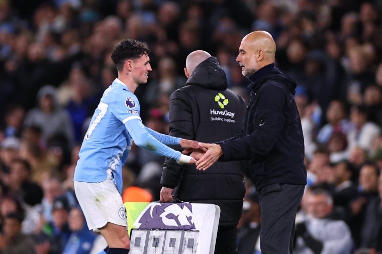 MANCHESTER, ENGLAND - MAY 13: Phil Foden of Manchester City and Pep Guardiola Manager / Head Coach of Manchester City during the Premier League match between Manchester City and Crystal Palace at Etihad Stadium on May 13, 2026 in Manchester, England. (Photo by Robbie Jay Barratt - AMA/Getty Images)