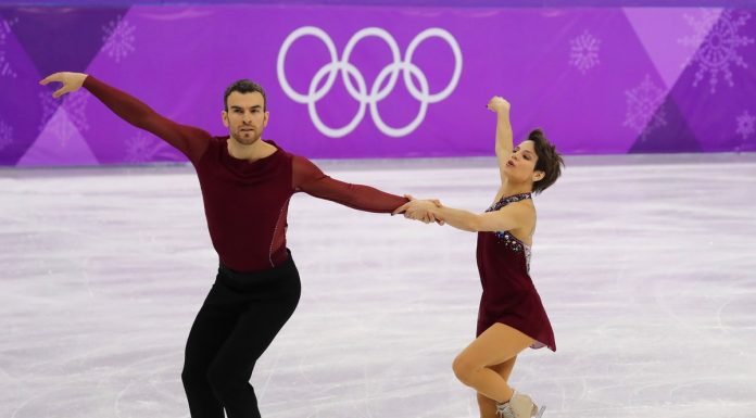 Retired Olympic Champion Fights Against Bullying Allegations During Suspension